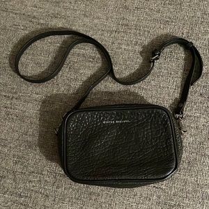 Status Anxiety Plunder Crossbody in Black Bubble Leather